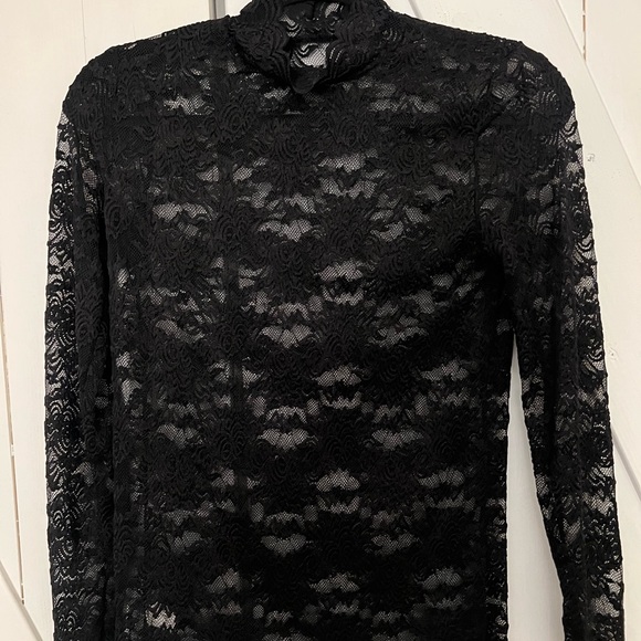 Black Lace long sleeve Top. Size: Med
Great condition; only worn one time. - Picture 1 of 8